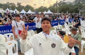 Catat 4,83 Detik! Robby Raih Emas dan Siapkan Investasi Masa Depan